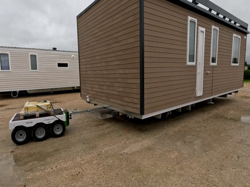 Elektrický tahač Robik Crawler 6x6<br />Manipulace s obytným kontejnerem / Převážení obytného kontejneru